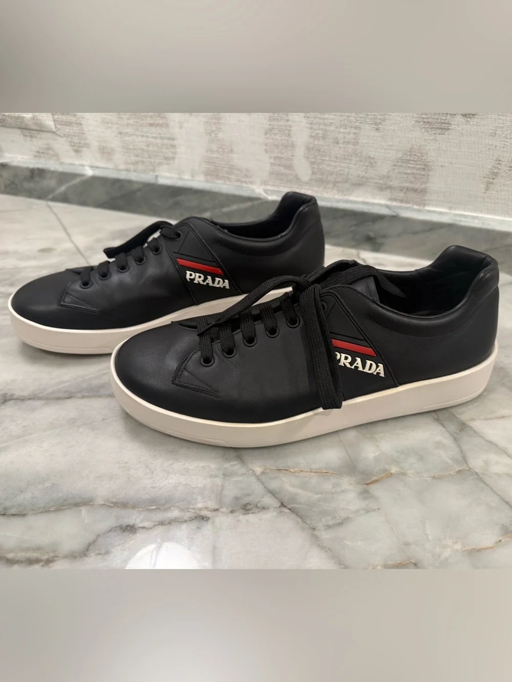 Prada Black Leather Sneakers with Red Stripe and White Sole
